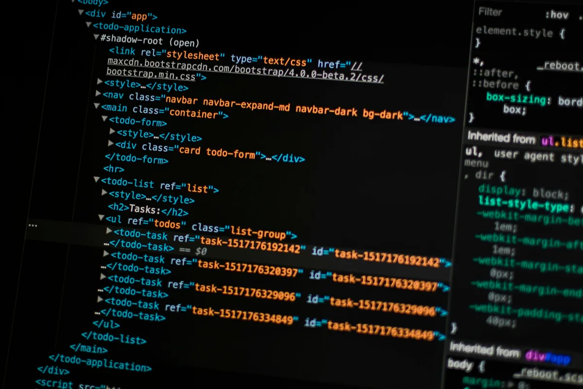 UK cybersecurity analyst monitoring network traffic and threat intelligence dashboards in a security operations centre