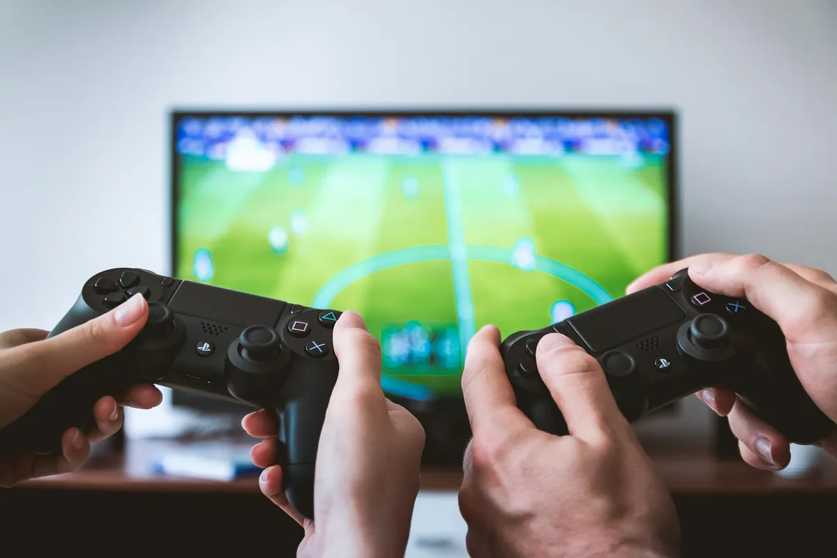 UK game developer working on 3D game engine and code editor across multiple monitors